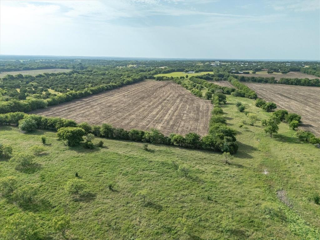 3506 County Road 1106 Rio Vista, TX 76093 - Photo 28 of 40 Aerial view of sparsely populated area featuring farmland