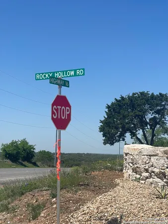 a view of a street with a building in the background