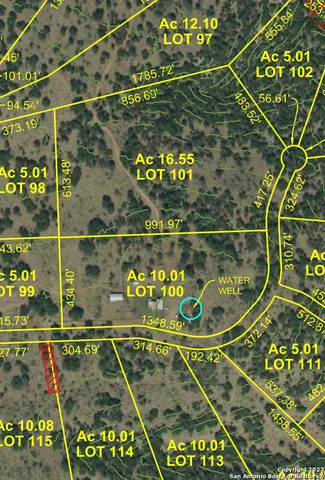 a view of a sign under a street sign