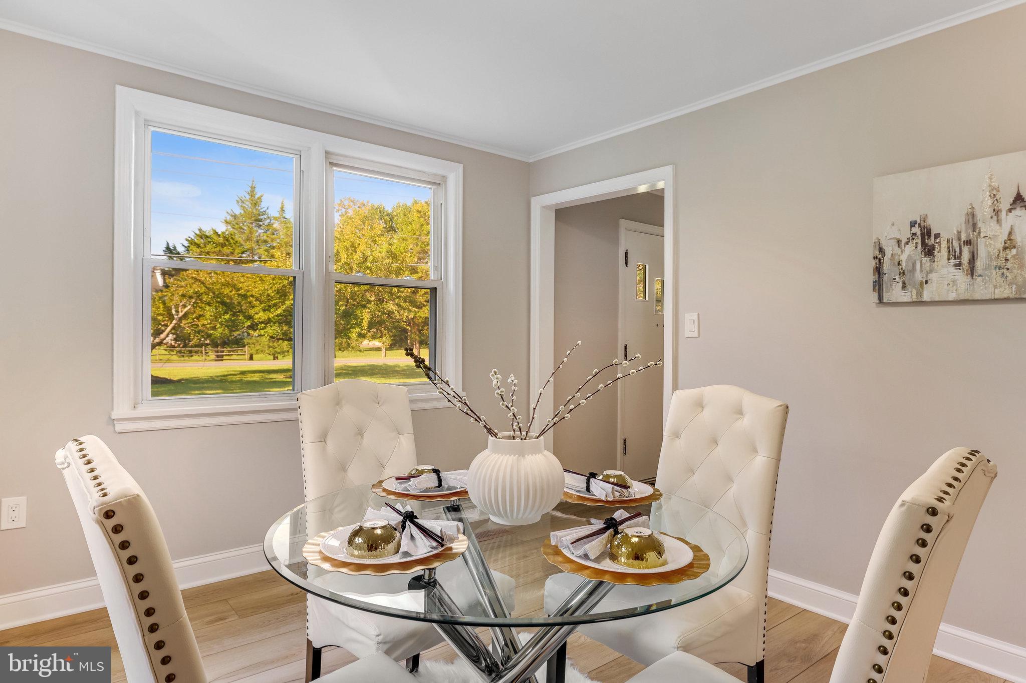 11410 Waples Mill Road Oakton, VA 22124 - Photo 14 of 62 Bright dining space with scenic views.