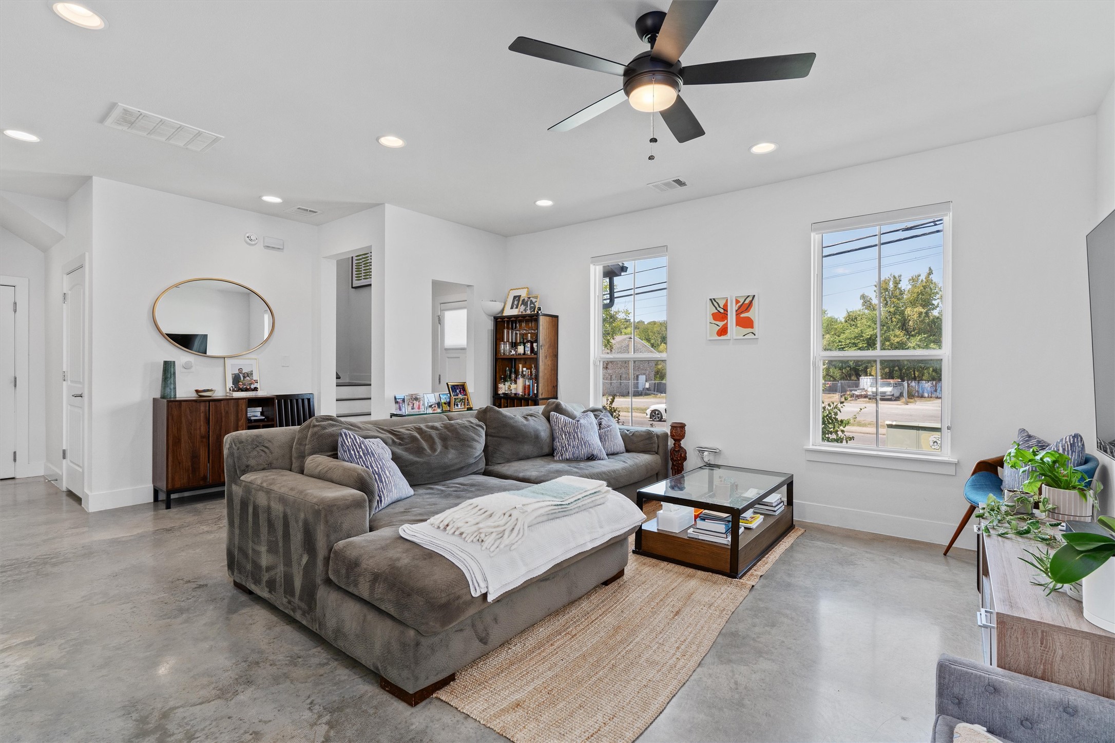 1309 Fort Branch Boulevard Austin, TX 78721 - Photo 5 of 19 a living room with furniture and a large window