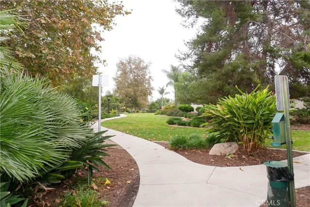 a view of a garden with a fountain