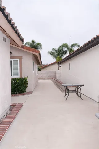 a view of a terrace with sitting area