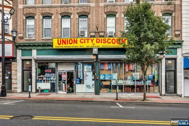 a view of a food mall next to a road