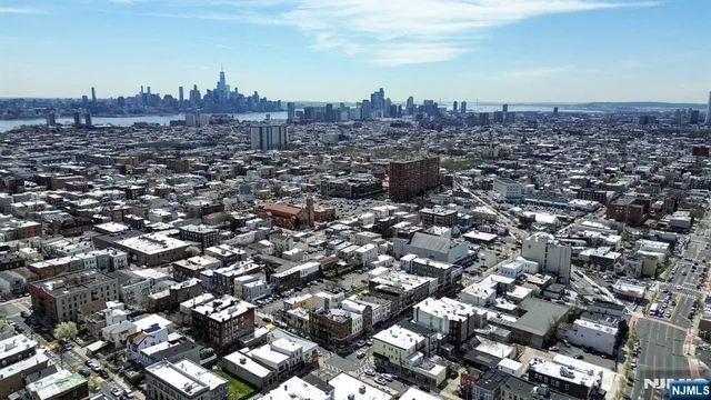an aerial view of a city with lots of residential buildings