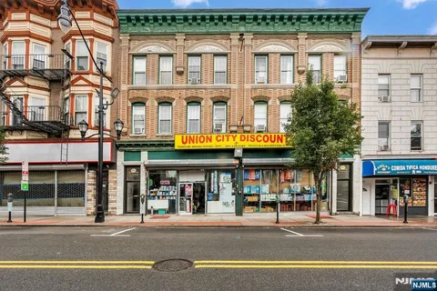 a view of a food market with retail shops