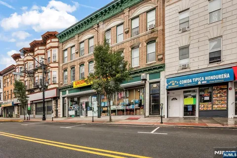 a view of a building and a street