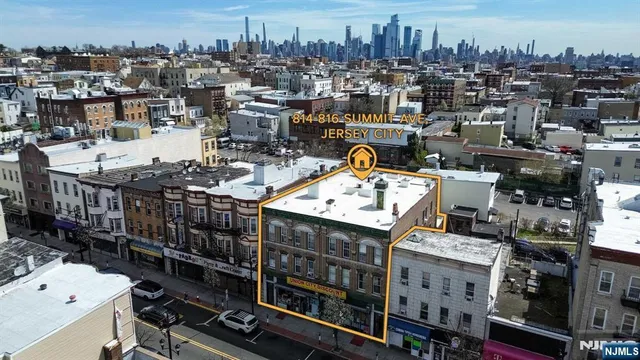 a view of a city with tall buildings