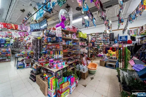 a store room with lots of fruit and vegetables