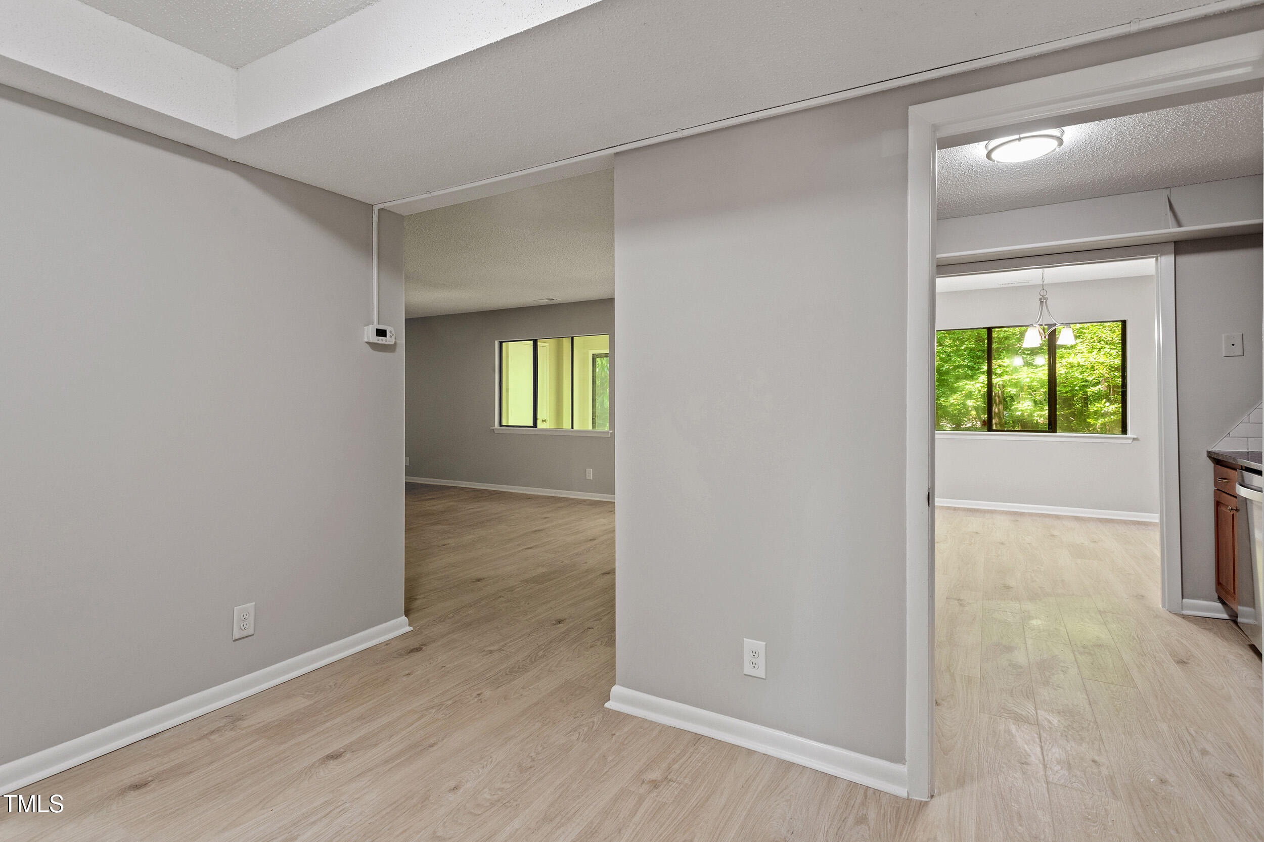 3088 Colony Road, Unit A Durham, NC 27705 - Photo 12 of 24 an empty room with windows and closet