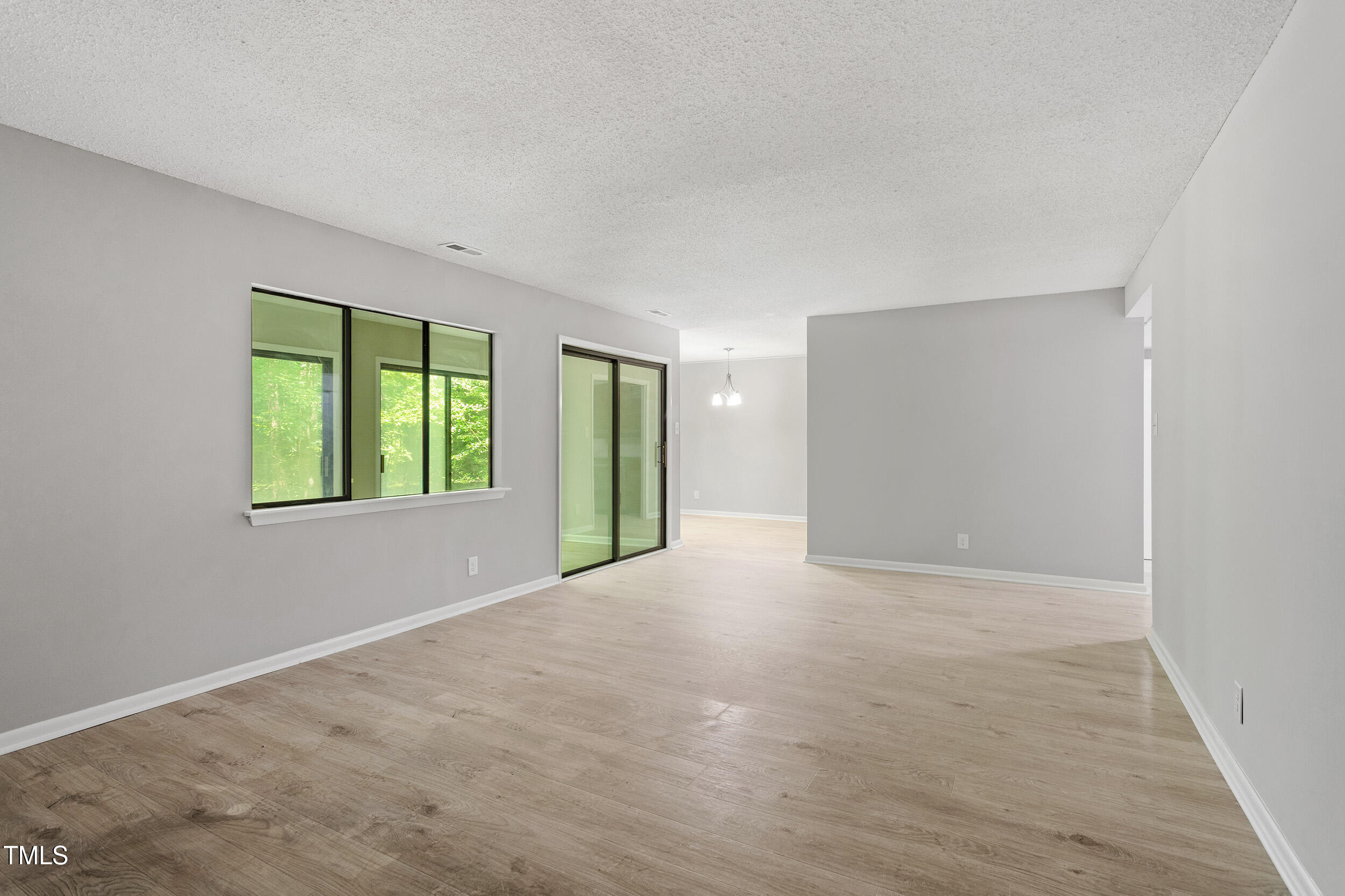 3088 Colony Road, Unit A Durham, NC 27705 - Photo 14 of 24 a view of an empty room with window