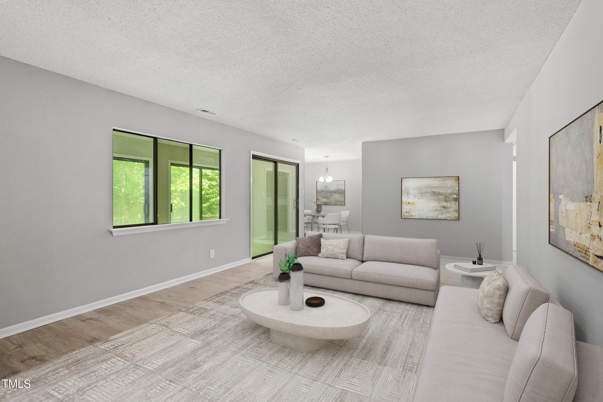 3088 Colony Road, Unit A Durham, NC 27705 - Photo 2 of 24 a living room with furniture and a large window