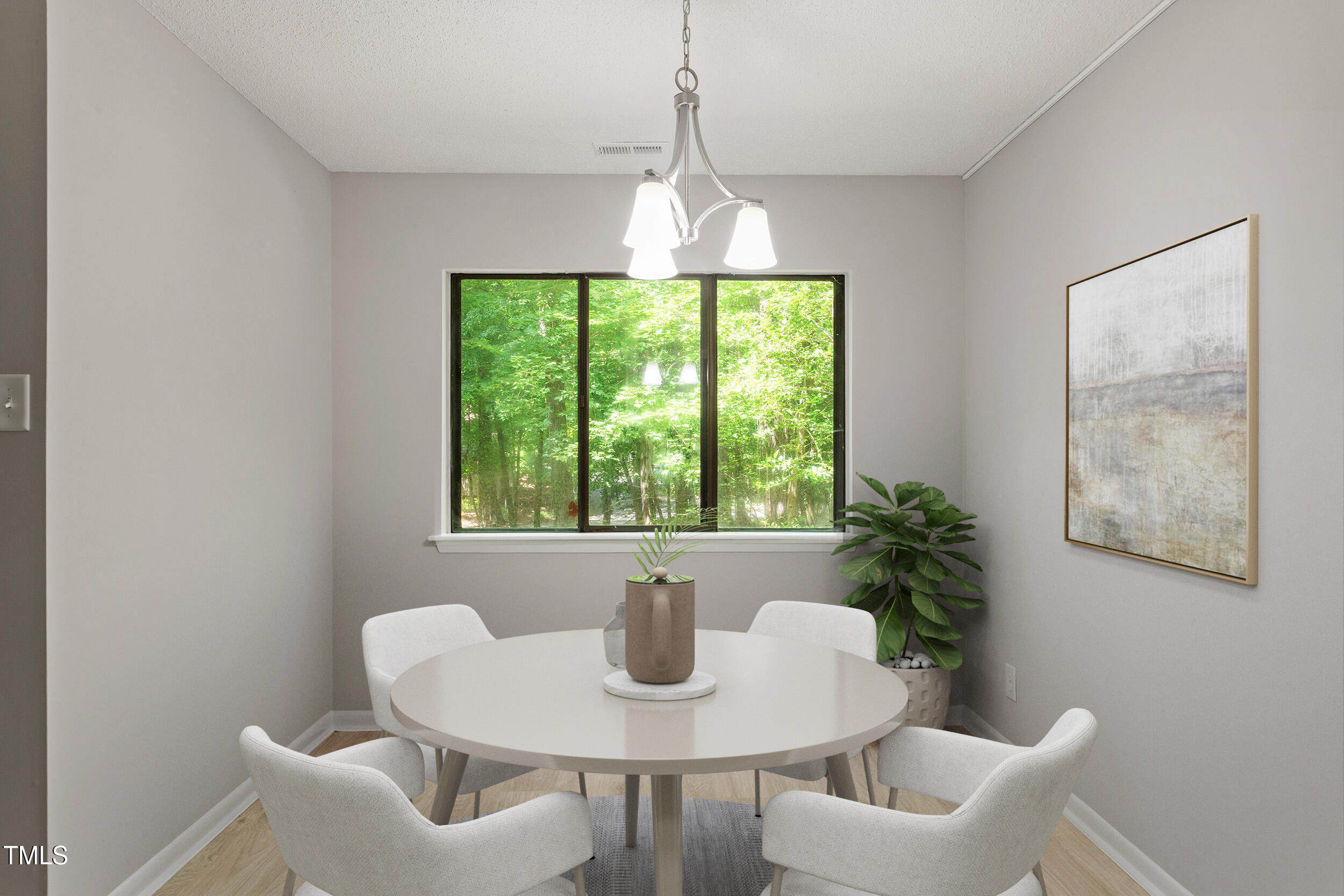 3088 Colony Road, Unit A Durham, NC 27705 - Photo 3 of 24 a dining room with furniture and window