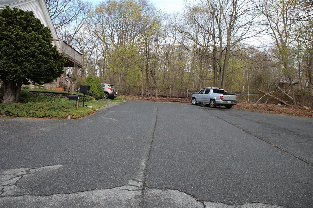 134 Baldwin Street, Unit 2 Fall River, MA 02720 - Photo 15 of 30 a view of a road with a cars parked beside a road