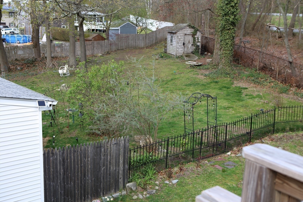 134 Baldwin Street, Unit 2 Fall River, MA 02720 - Photo 25 of 30 a view of a backyard with a garden