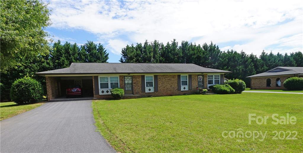 4887 County Home Road, Unit A1J2 Conover, NC 28613 - Photo 13 of 28 a view of a house with garden and yard