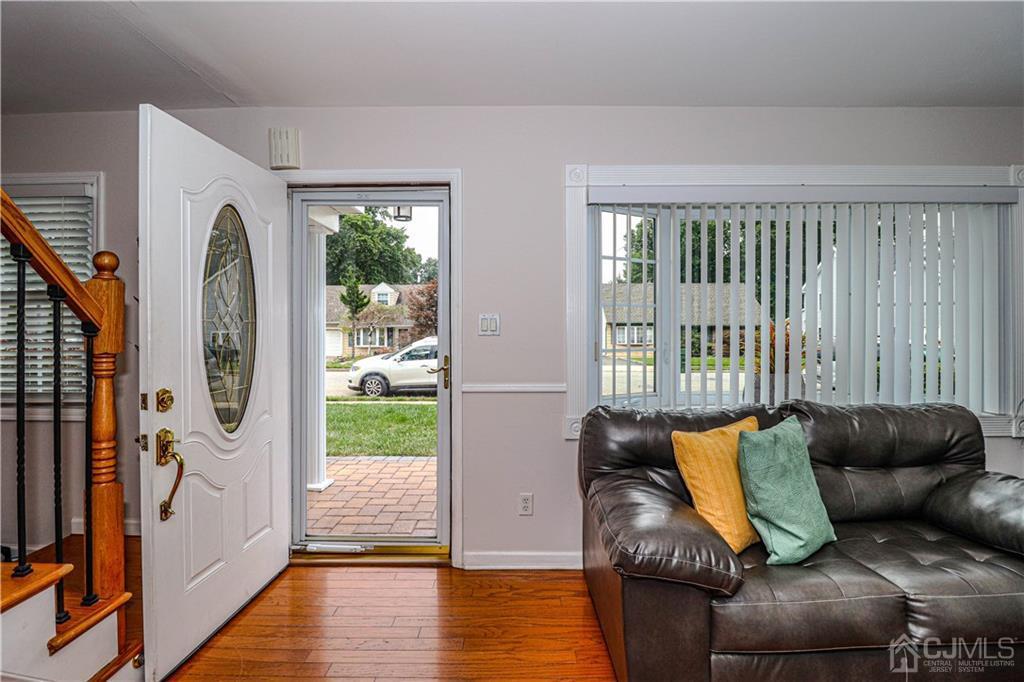90 Ashley Road Edison, NJ 08817 - Photo 8 of 32 a living room with furniture and a large window