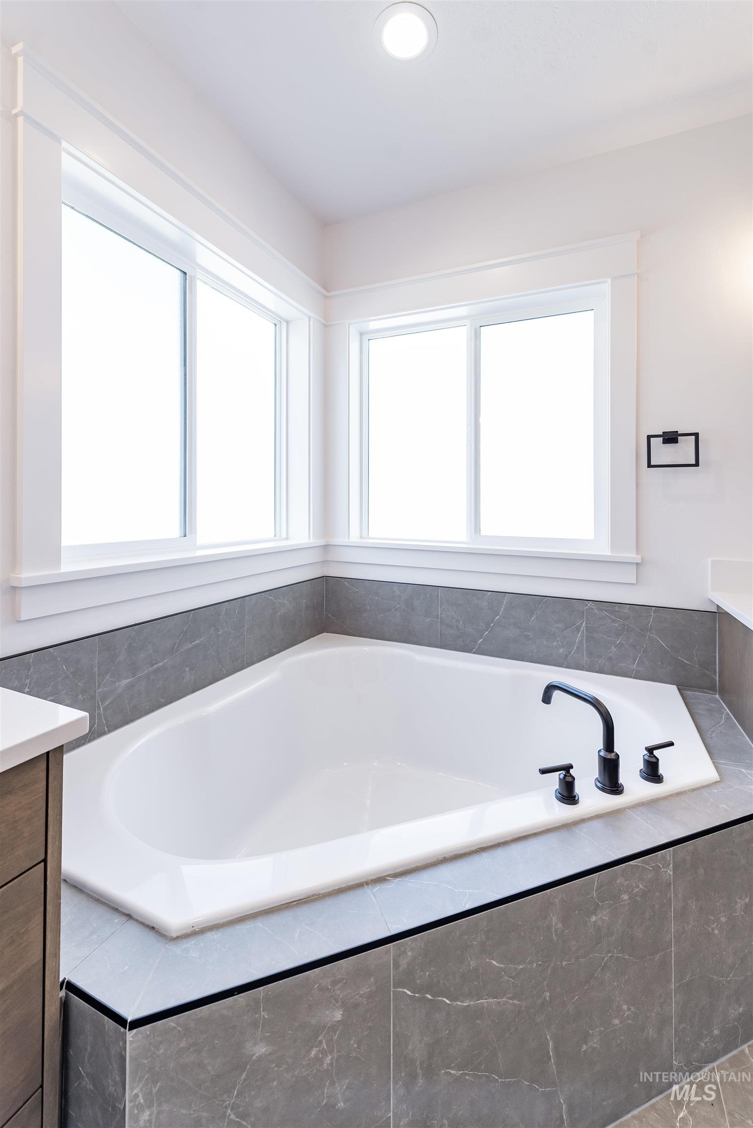 400 South Diesel Way Boise, ID 83716 - Photo 21 of 44 Full bathroom with vanity and a garden tub