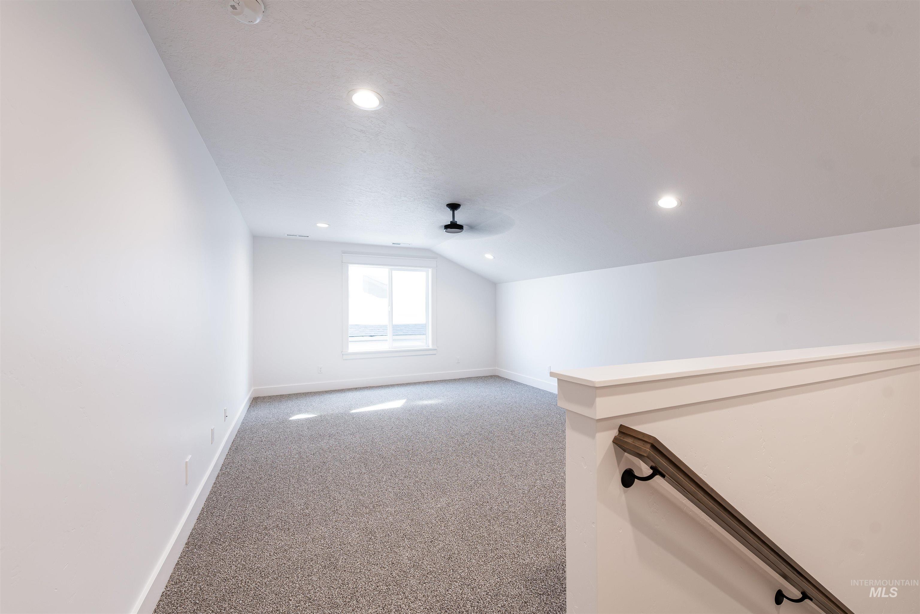 400 South Diesel Way Boise, ID 83716 - Photo 35 of 44 Bonus room featuring light carpet, lofted ceiling, a ceiling fan, and recessed lighting