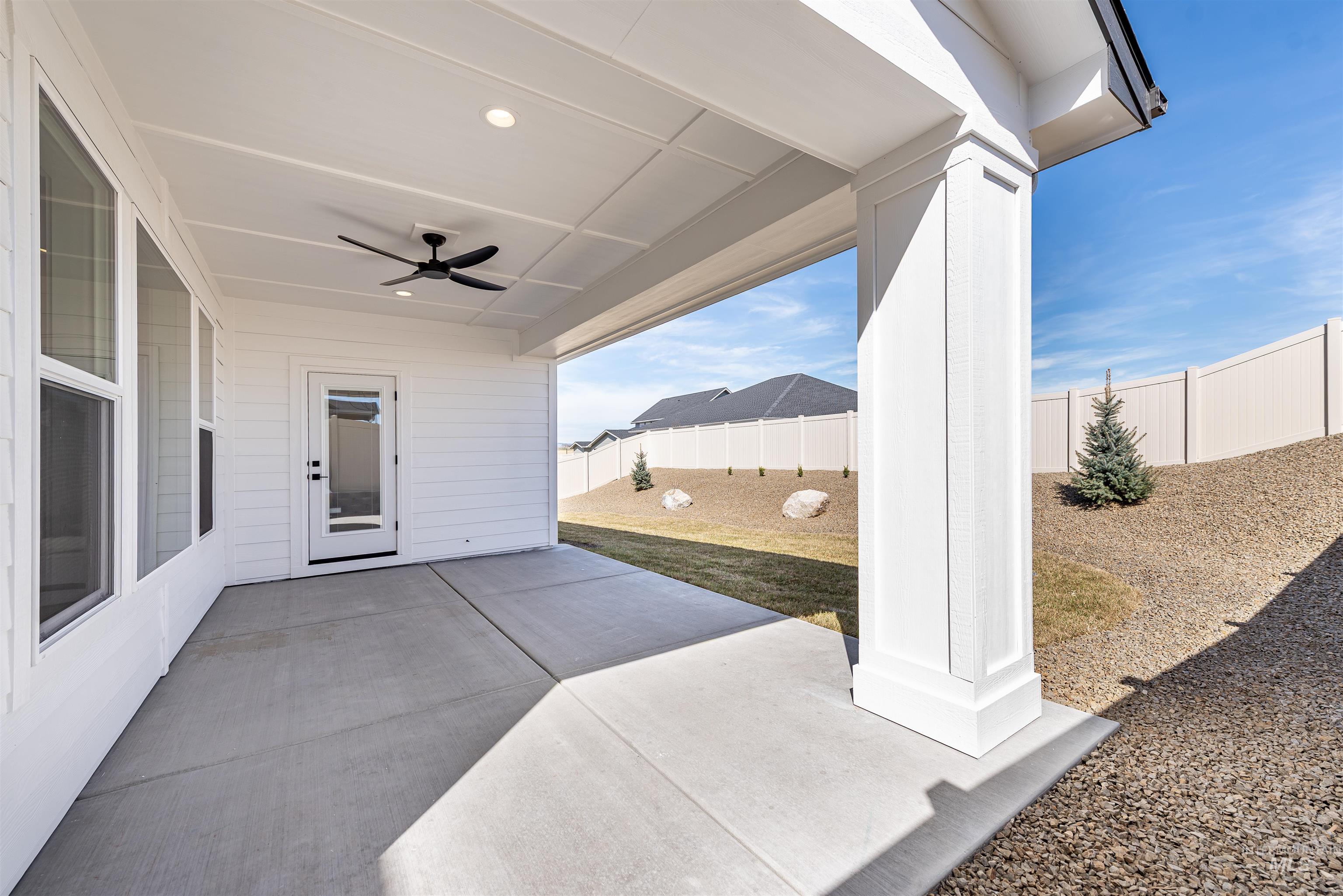 400 South Diesel Way Boise, ID 83716 - Photo 41 of 44 Fenced backyard featuring a ceiling fan and a patio
