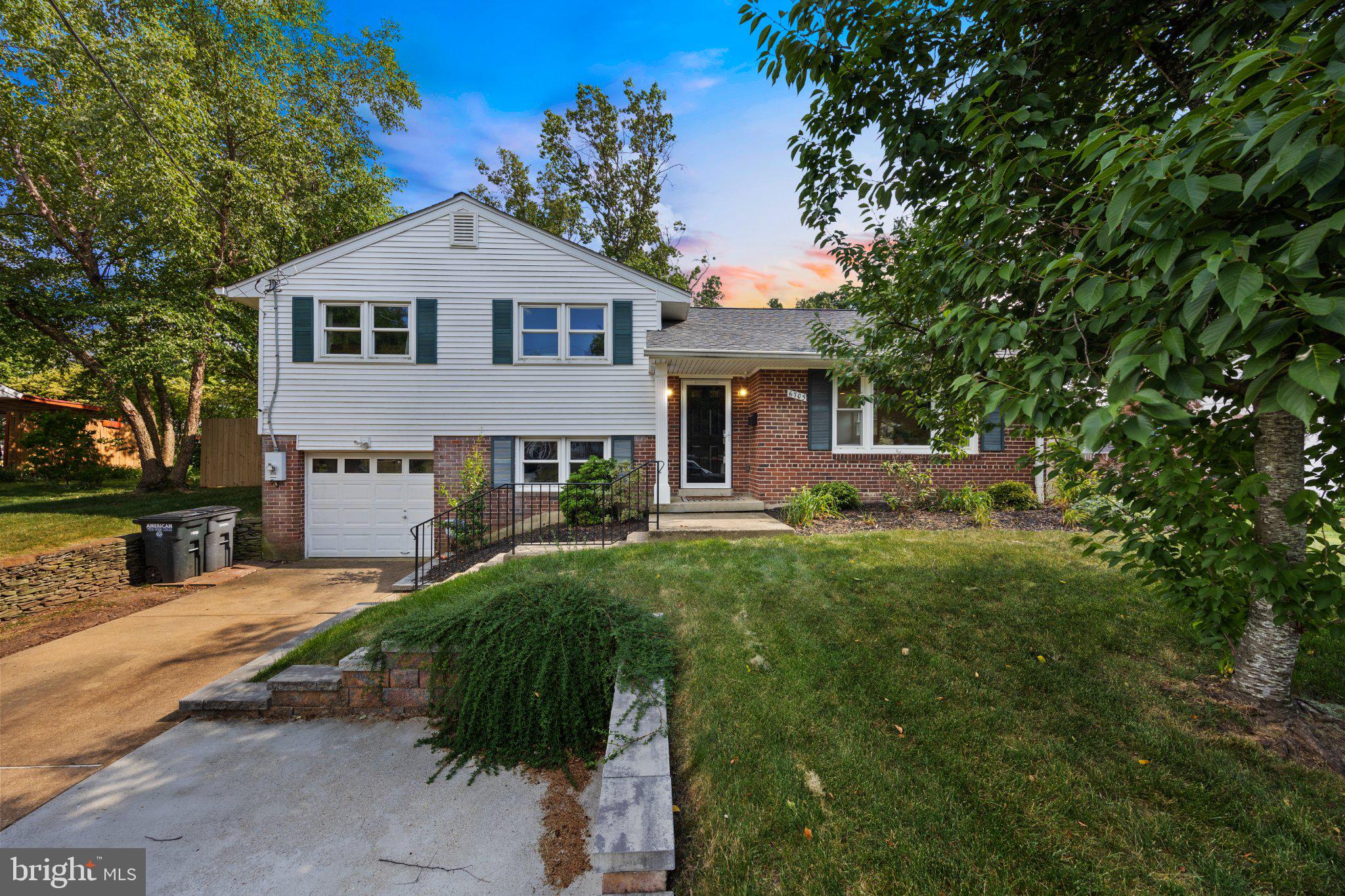 6705 New Hope Drive Springfield, VA 22151 - Photo 2 of 67 Charming home with lush greenery.