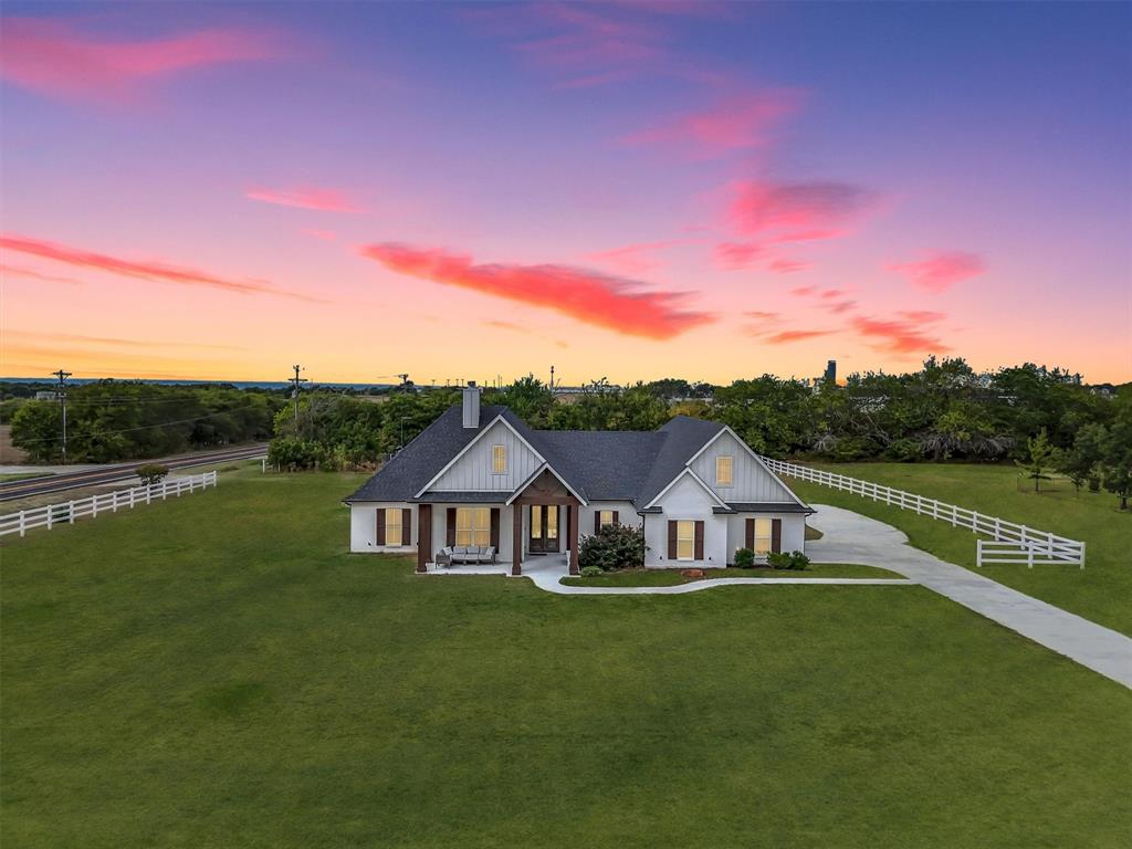 101 Sky Way New Fairview, TX 76078 - Photo 1 of 20 a view of house with garden