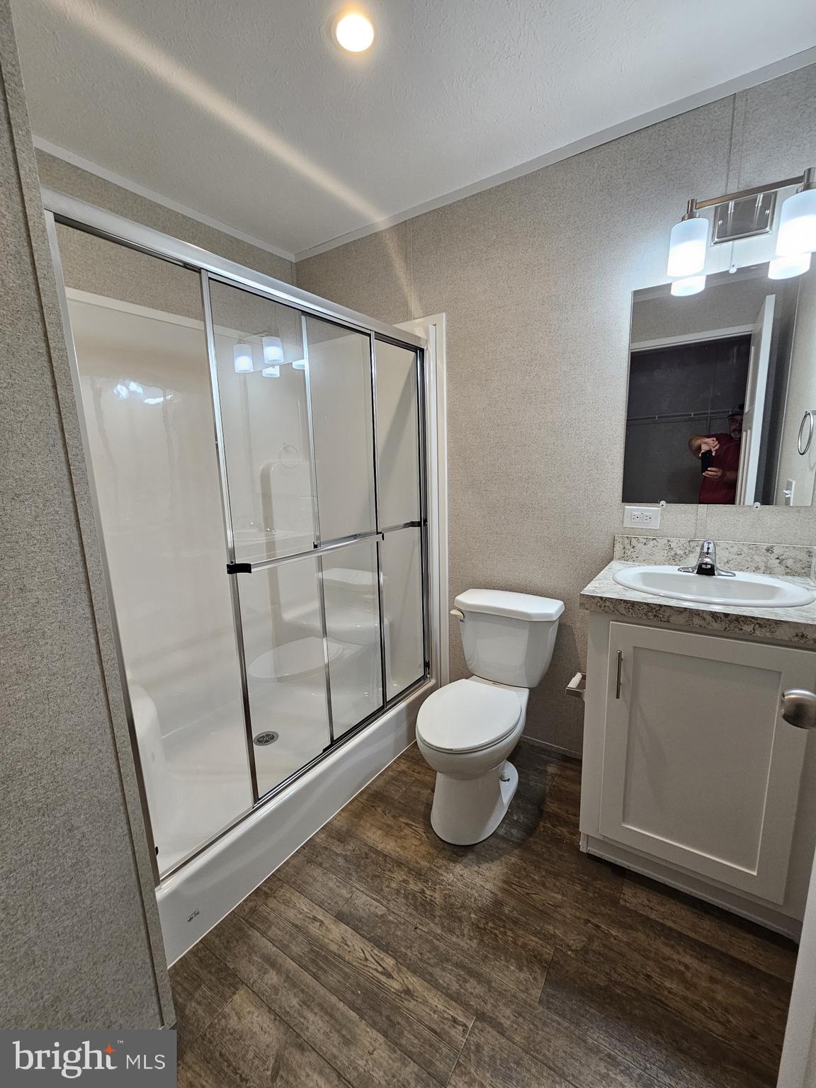 465 Royal Manor Road Easton, PA 18042 - Photo 7 of 14 a white toilet sitting next to a bathroom sink