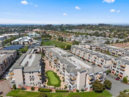 an aerial view of a city with lots of residential buildings