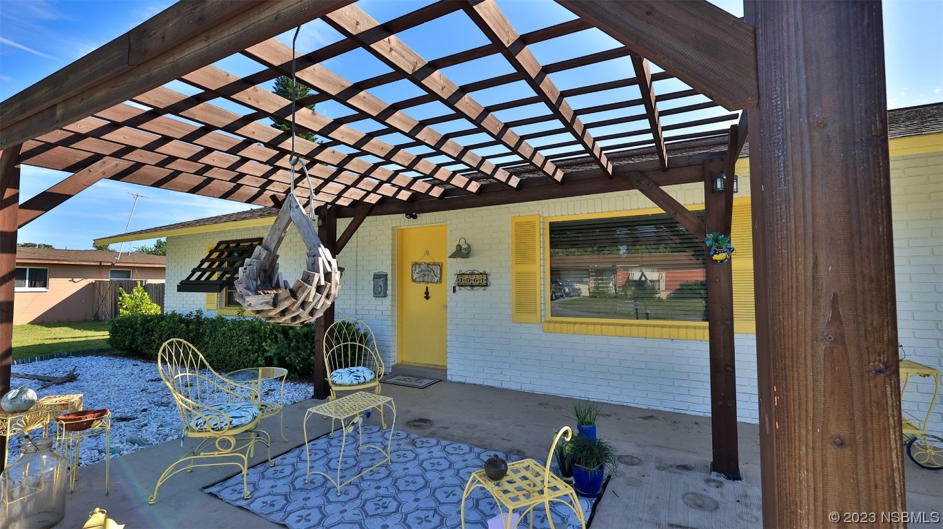 1861 Evergreen Drive Edgewater, FL 32141 - Photo 2 of 31 a front view of a house with garden