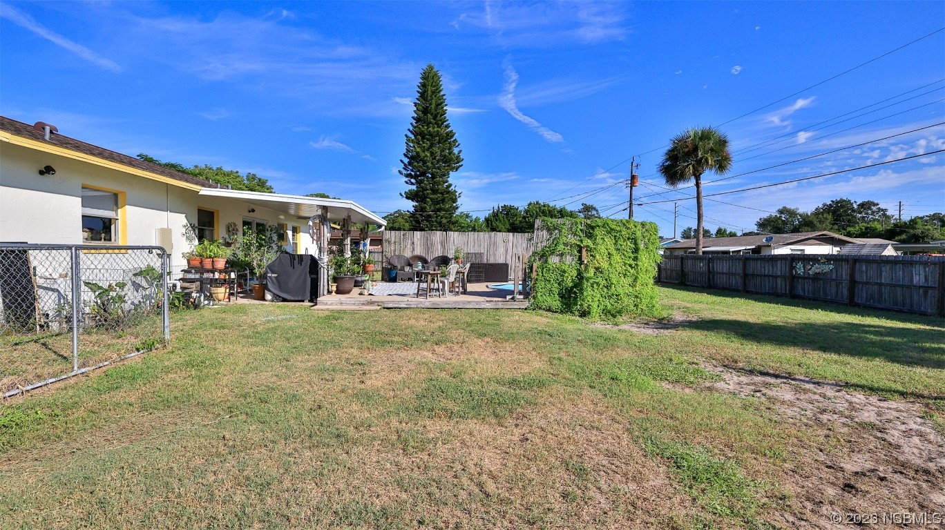 1861 Evergreen Drive Edgewater, FL 32141 - Photo 27 of 31 a view of yard with a slide