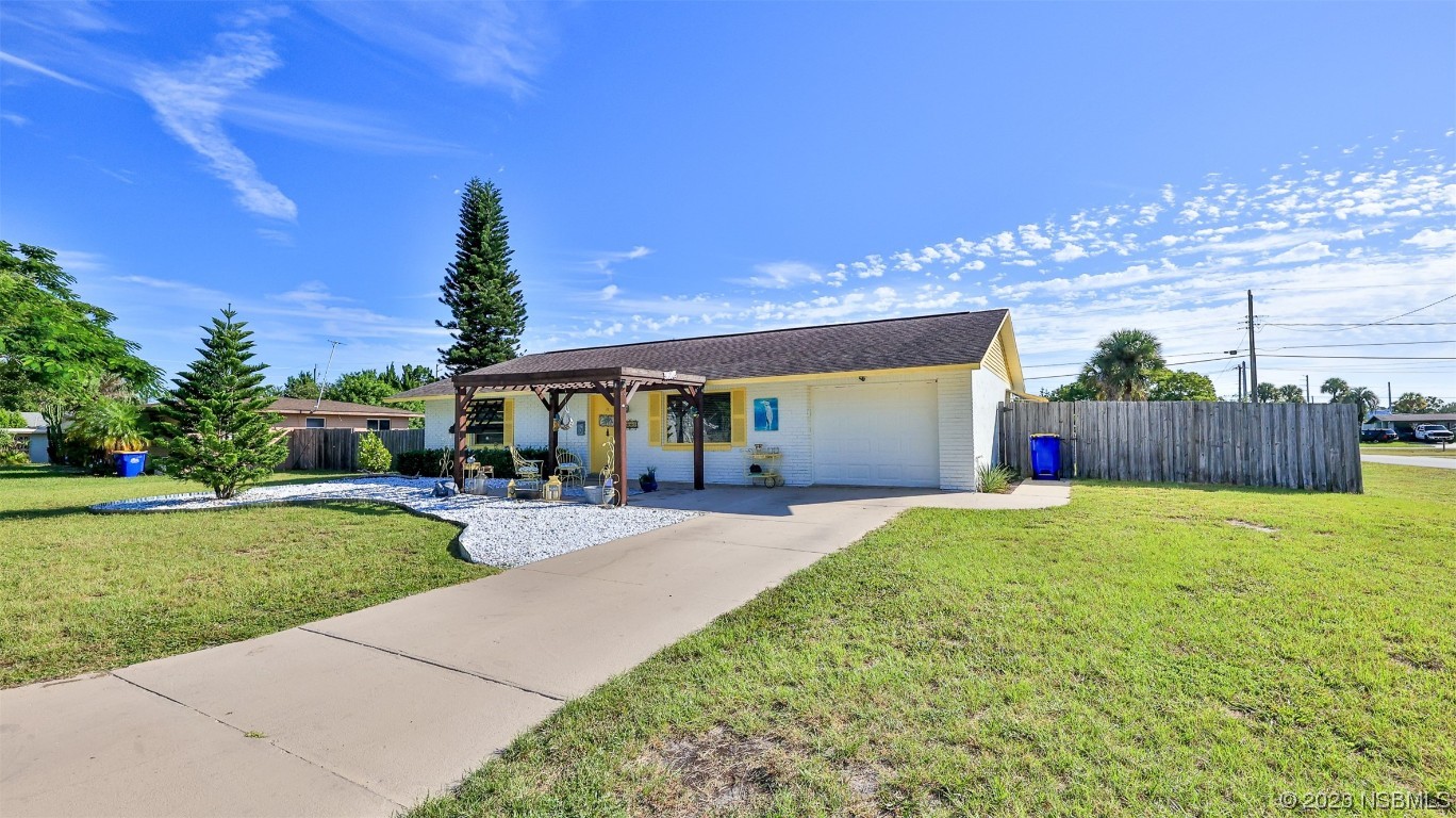 1861 Evergreen Drive Edgewater, FL 32141 - Photo 31 of 31 a view of a house with backyard and sitting area