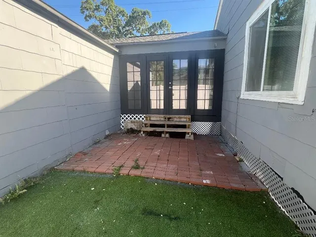 a view of a back yard of the house