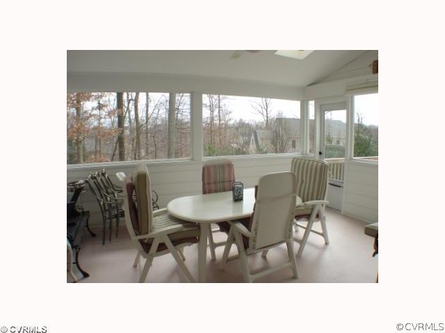 14441 Newgate Road Midlothian, VA 23113 - Photo 8 of 10 a dining room with furniture and a large window