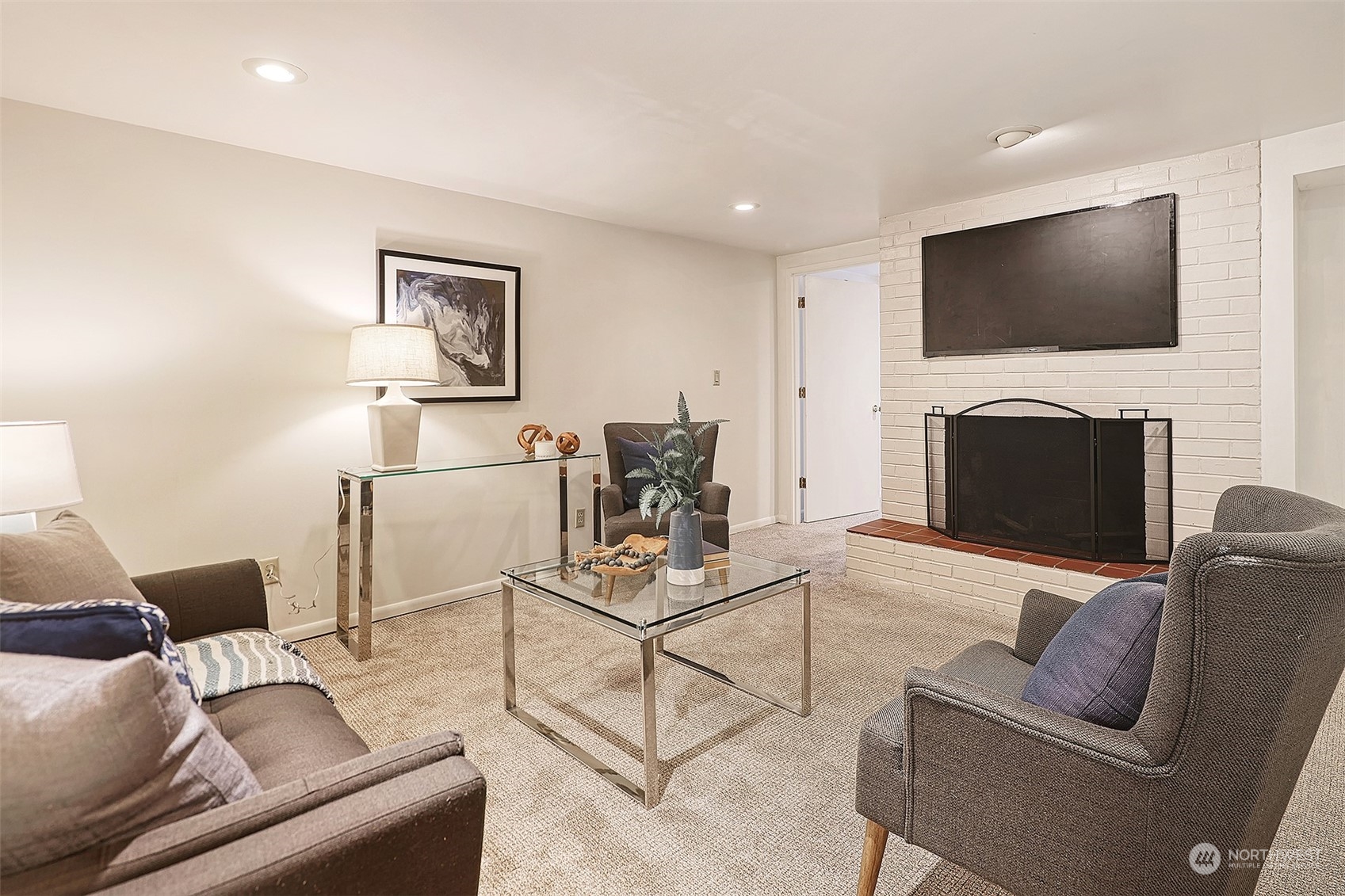 612 9th Avenue North Edmonds, WA 98020 - Photo 18 of 39 a living room with furniture and a flat screen tv
