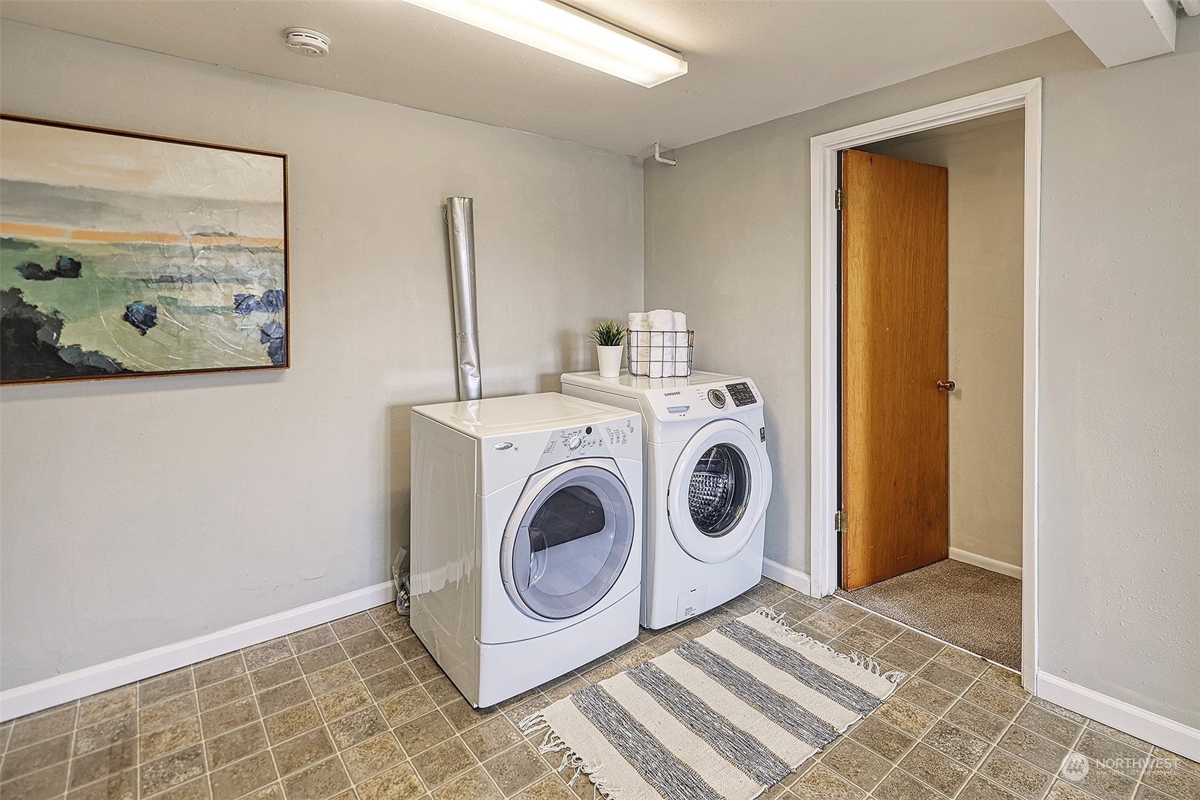 612 9th Avenue North Edmonds, WA 98020 - Photo 23 of 39 a utility room with dryer and washer