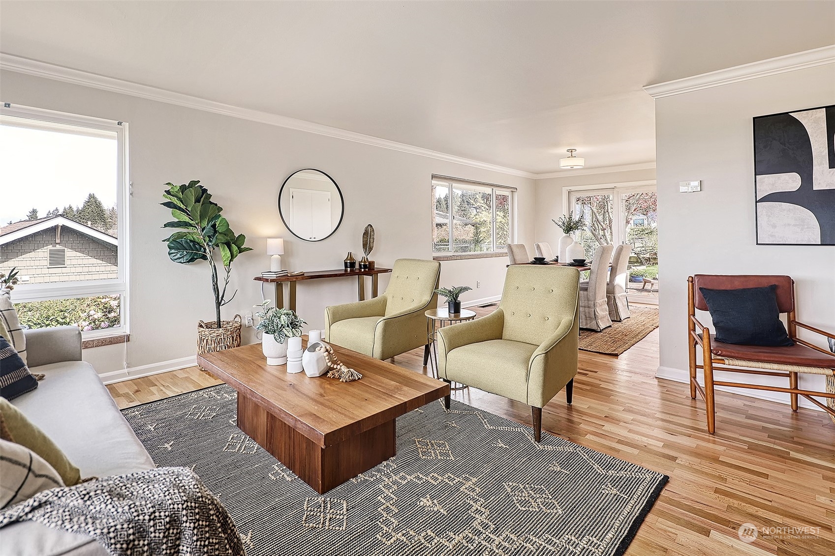 612 9th Avenue North Edmonds, WA 98020 - Photo 3 of 39 a living room with furniture a rug and a floor to ceiling window