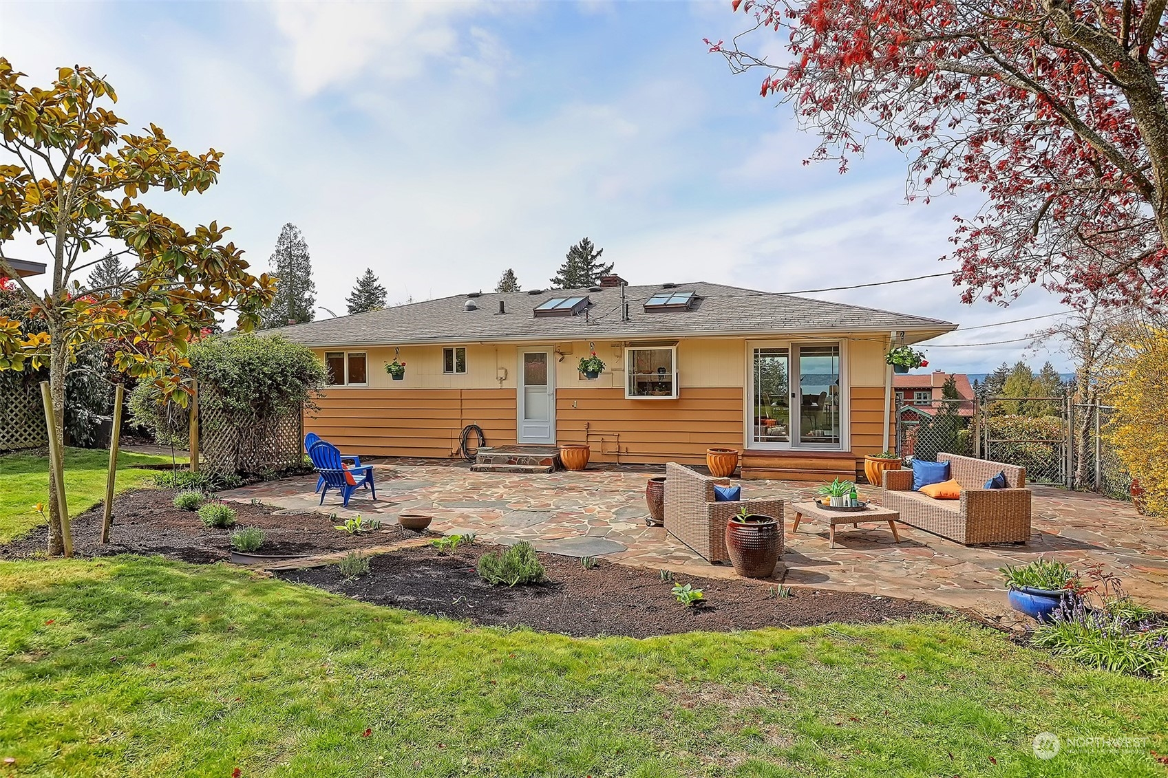 612 9th Avenue North Edmonds, WA 98020 - Photo 34 of 39 a view of a house with backyard and sitting area