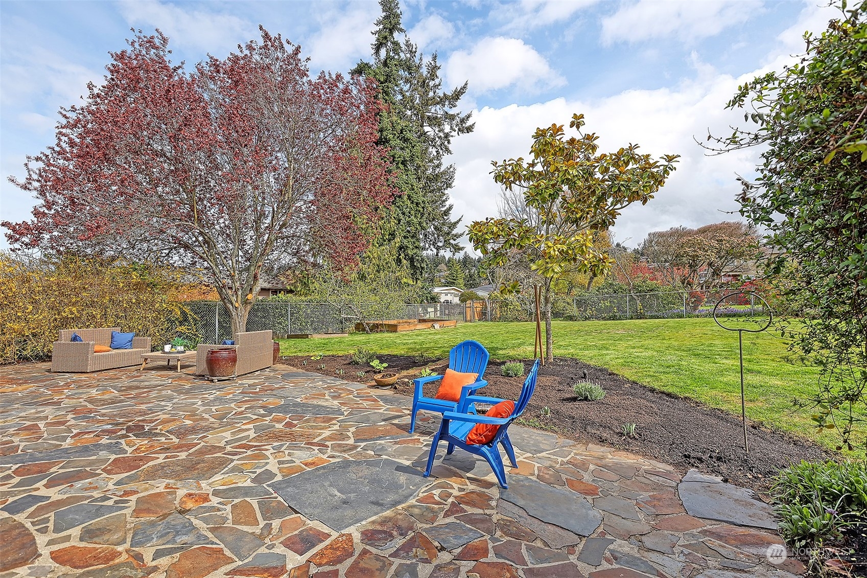 612 9th Avenue North Edmonds, WA 98020 - Photo 36 of 39 a view of a park with large trees and a slide