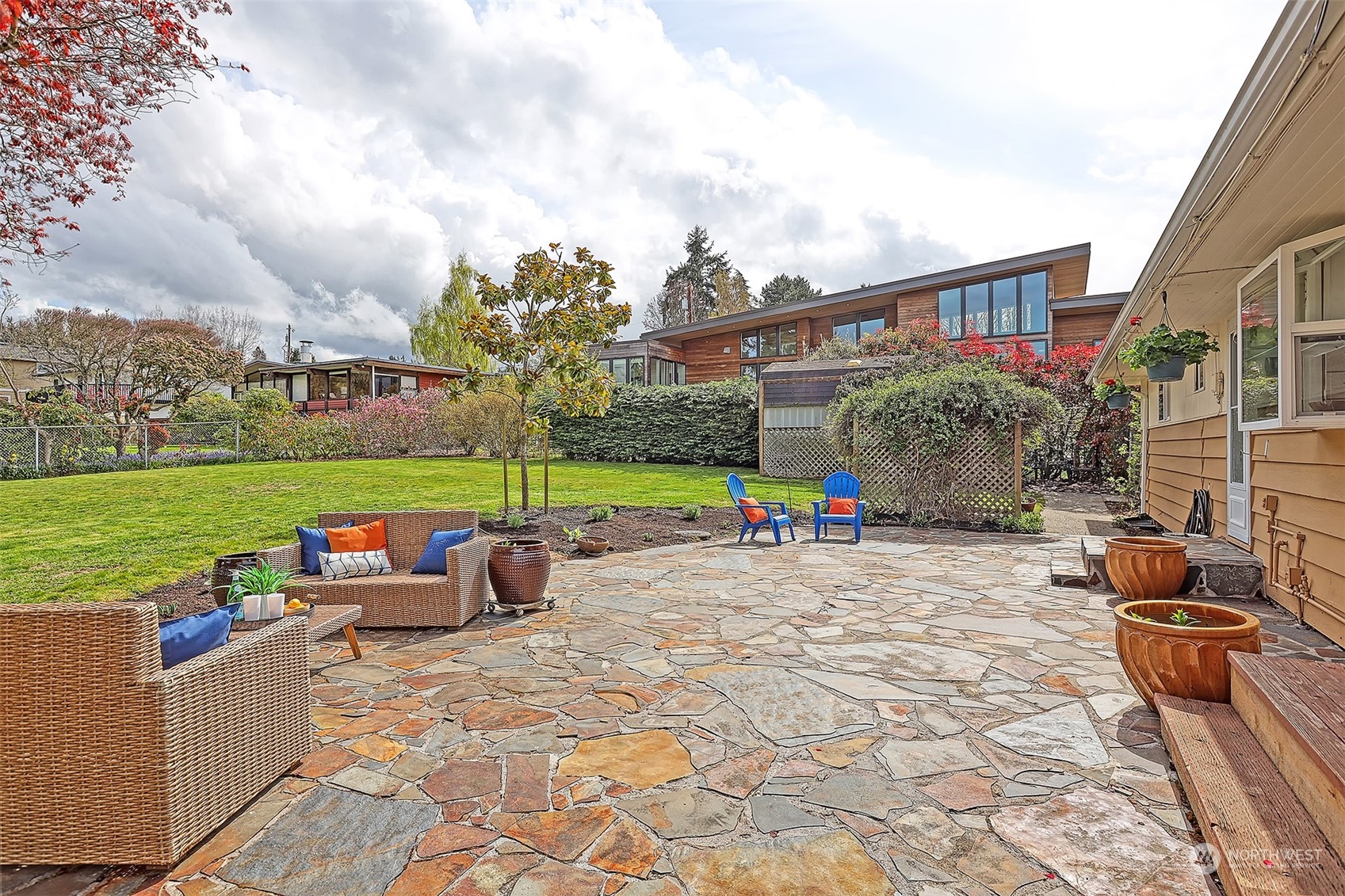 612 9th Avenue North Edmonds, WA 98020 - Photo 37 of 39 a view of a house with backyard and sitting area
