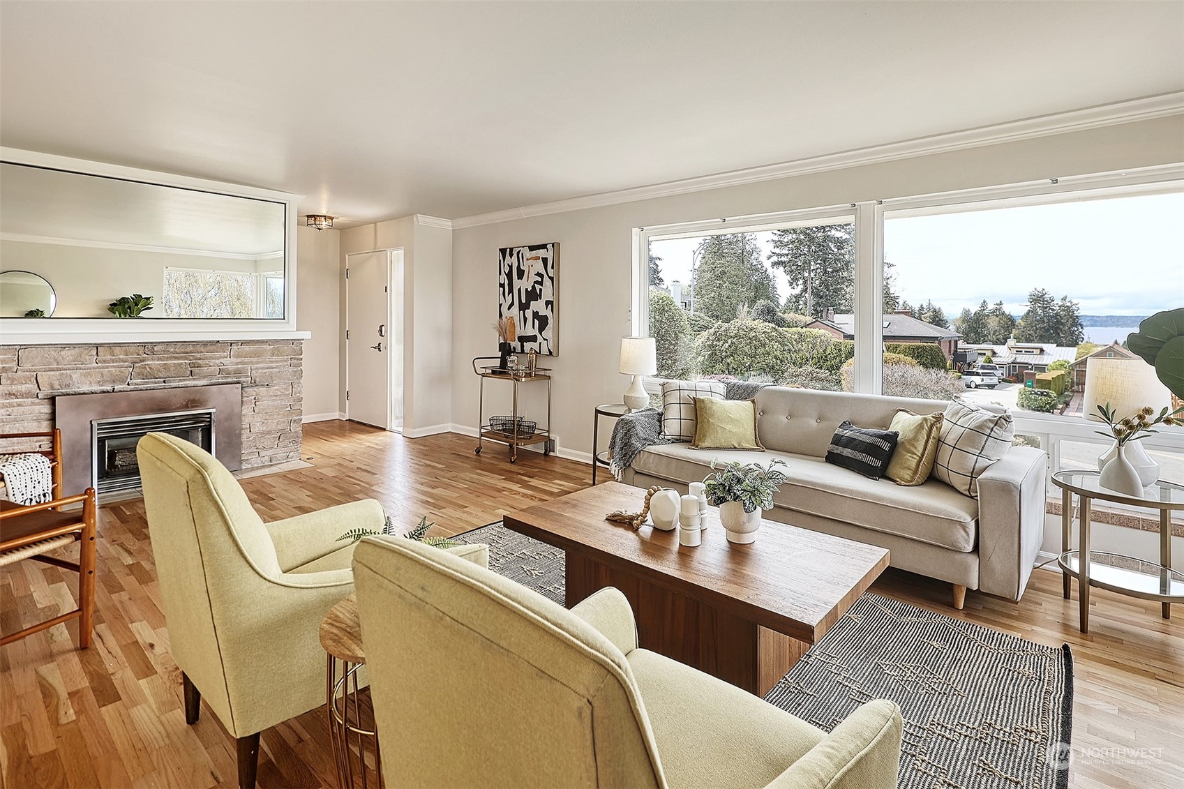 612 9th Avenue North Edmonds, WA 98020 - Photo 5 of 39 a living room with furniture and a fireplace