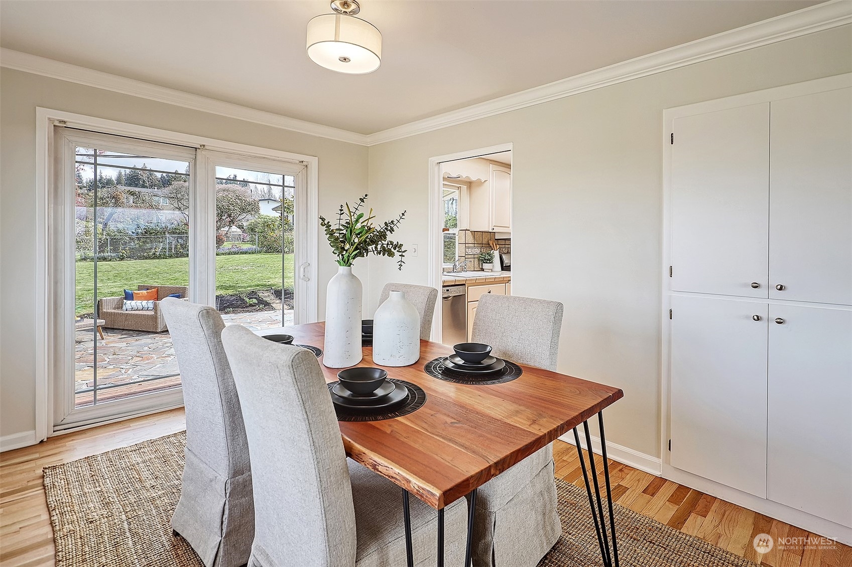 612 9th Avenue North Edmonds, WA 98020 - Photo 8 of 39 a view of a dining room with furniture window and outside view