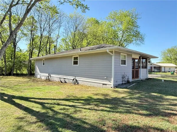 a view of a house with a swimming pool