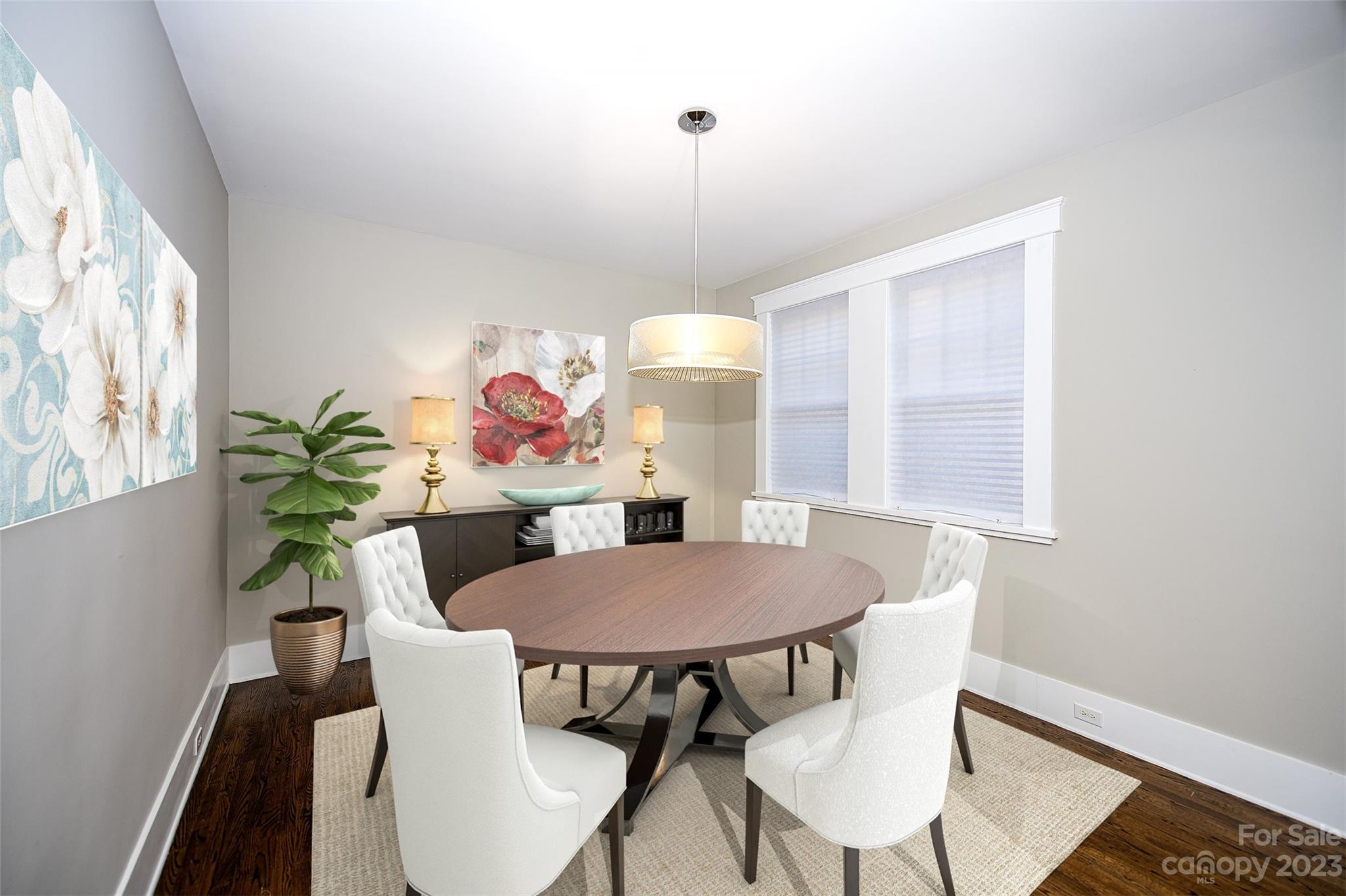 1403 Devon Drive Charlotte, NC 28209 - Photo 13 of 46 a view of a dining room with furniture and wooden floor