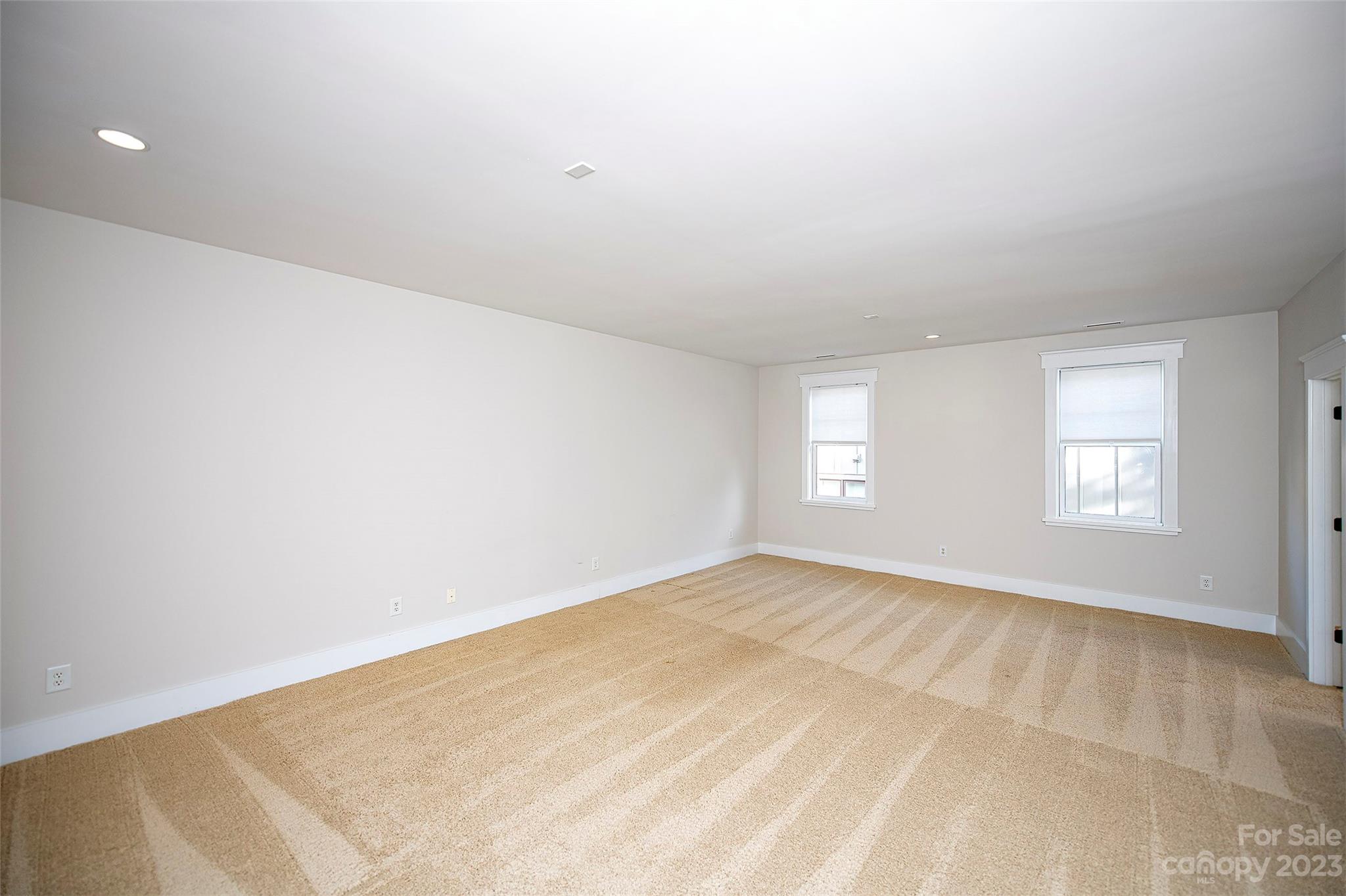 1403 Devon Drive Charlotte, NC 28209 - Photo 27 of 46 a view of an empty room with a window