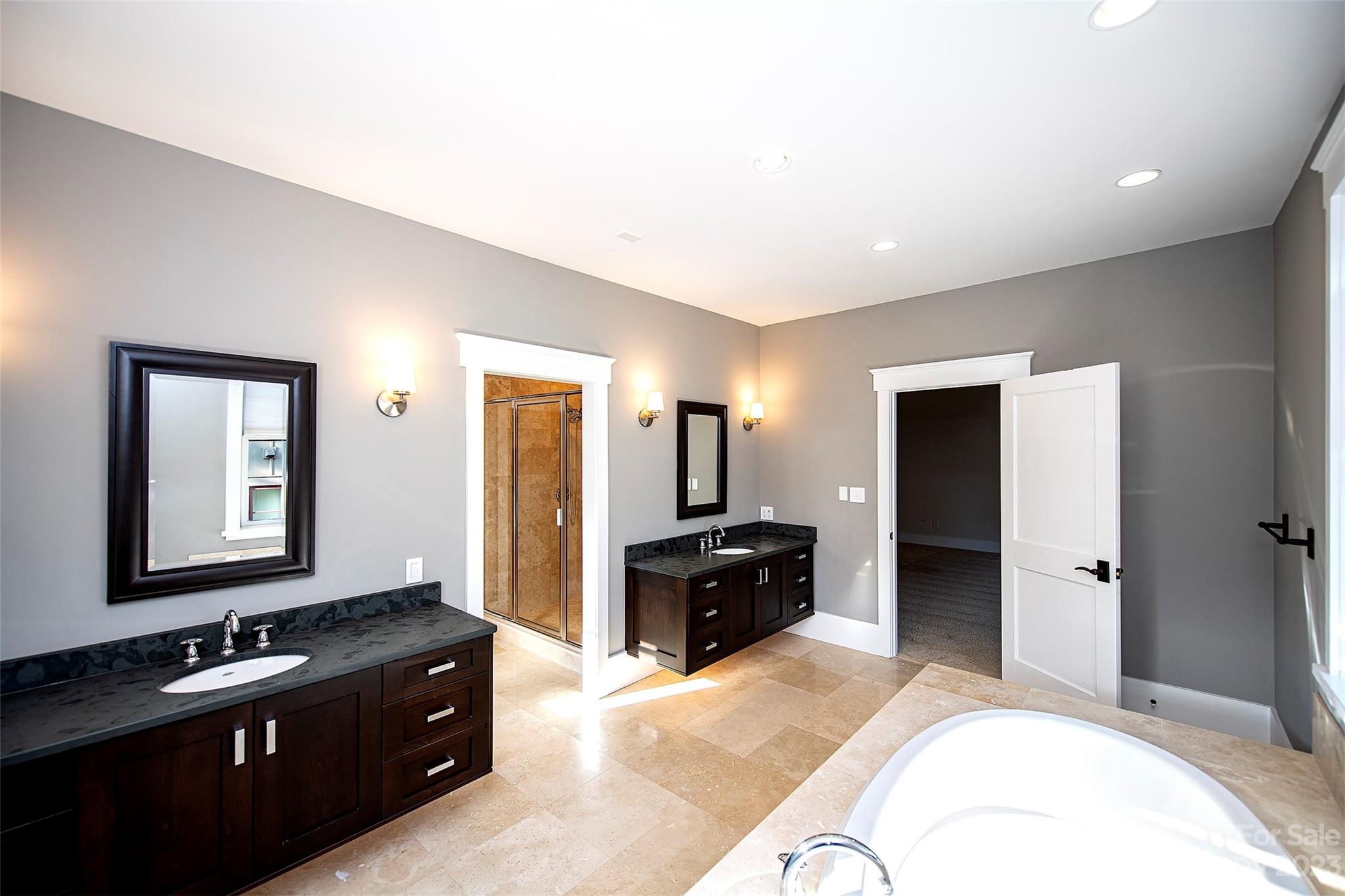 1403 Devon Drive Charlotte, NC 28209 - Photo 31 of 46 a spacious bedroom with a bed and a dresser