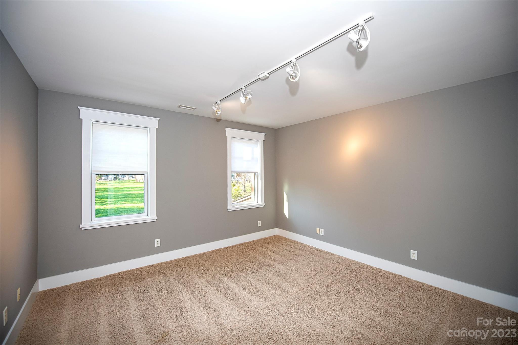 1403 Devon Drive Charlotte, NC 28209 - Photo 36 of 46 a view of an empty room with a window
