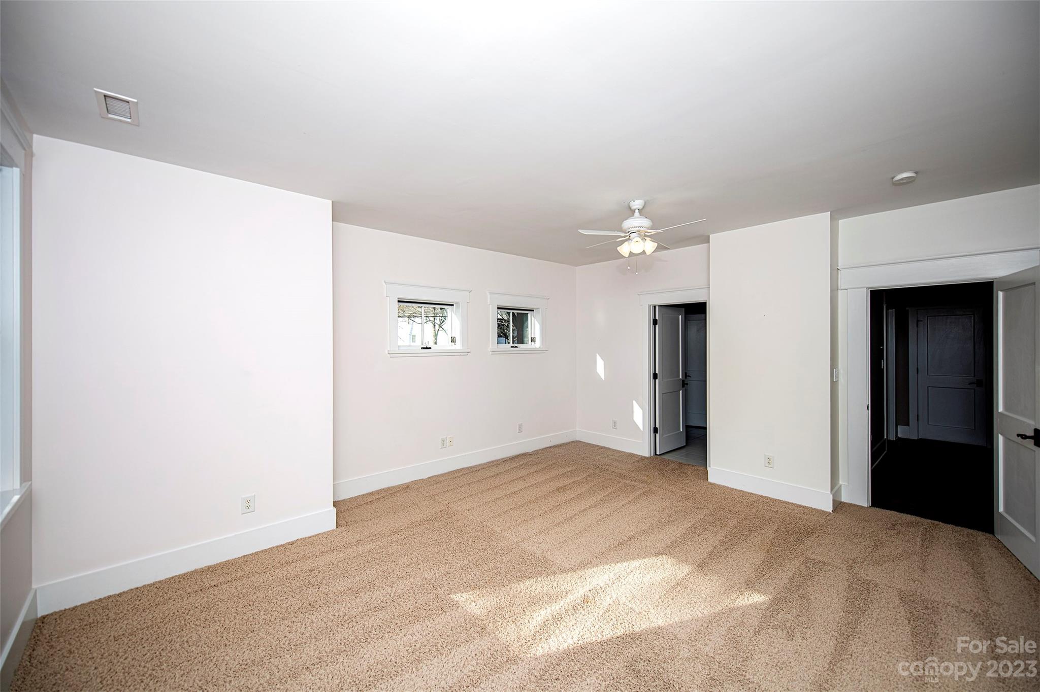 1403 Devon Drive Charlotte, NC 28209 - Photo 42 of 46 a view of empty room with wooden floor