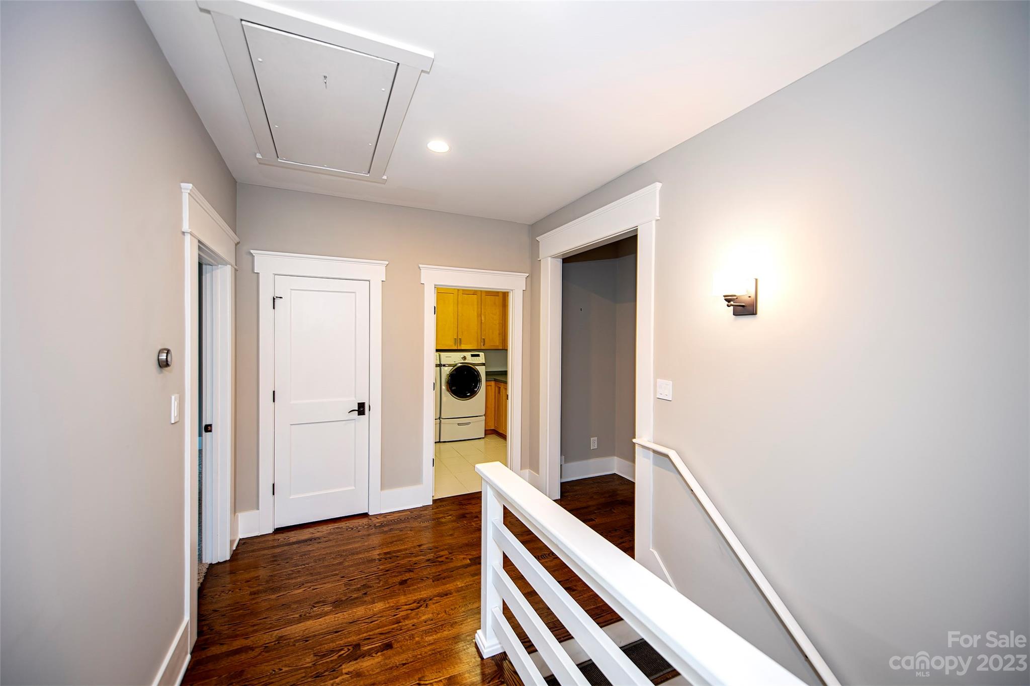 1403 Devon Drive Charlotte, NC 28209 - Photo 43 of 46 a view of room with window and wooden floor