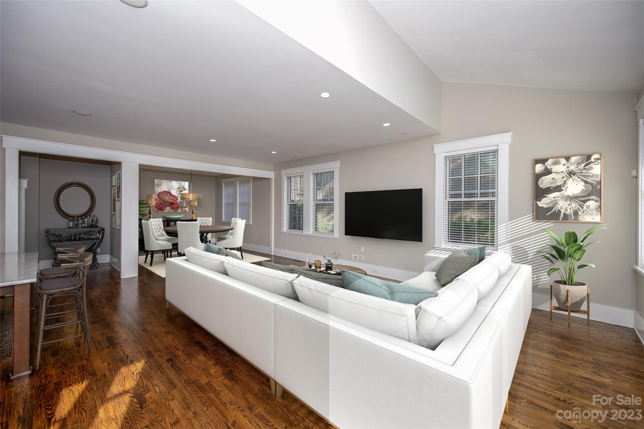 1403 Devon Drive Charlotte, NC 28209 - Photo 6 of 46 a living room with furniture flat screen tv and a fireplace