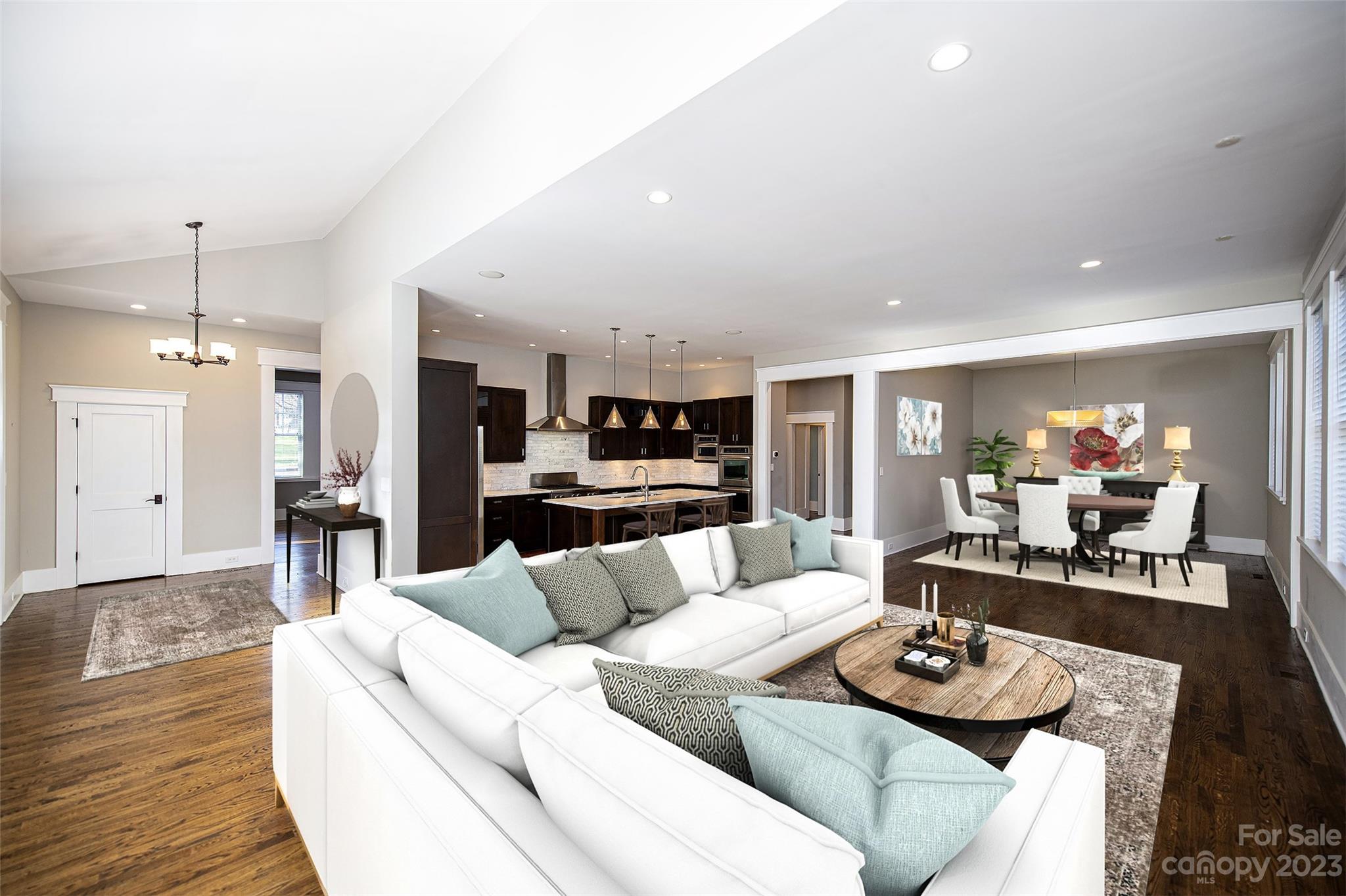 1403 Devon Drive Charlotte, NC 28209 - Photo 8 of 46 a living room with furniture and a dining table with wooden floor